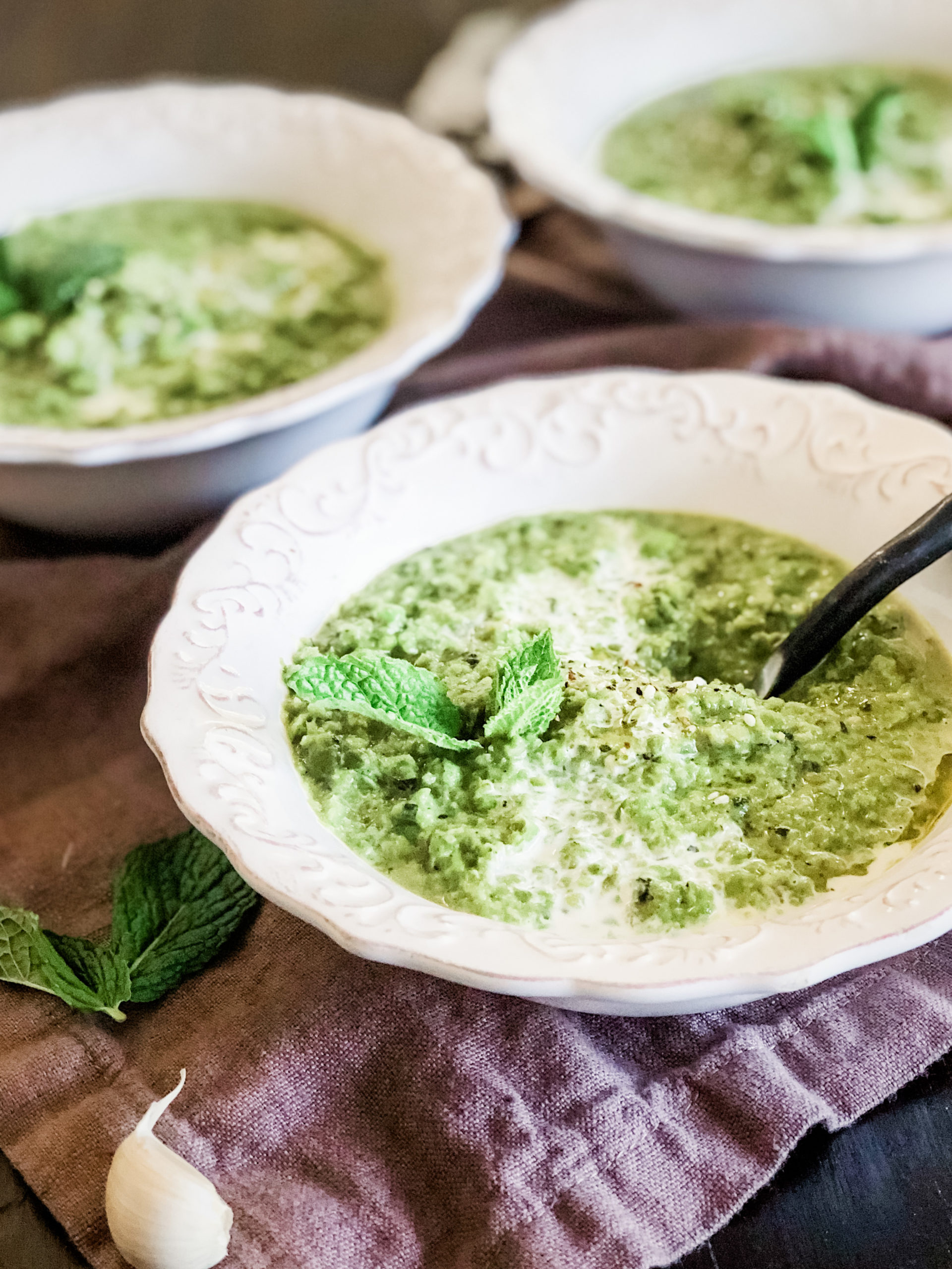 Spring Pea Soup from Seasonally Jane -- at-home cooking inspired by the seasons. This fresh Spring Pea Soup is a clean recipe with minimal ingredients. The secret ingredients to round out the pea flavor are asparagus and mint.